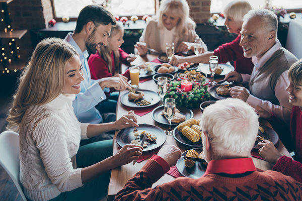 a multigenerational family enjoying time together at Christmas