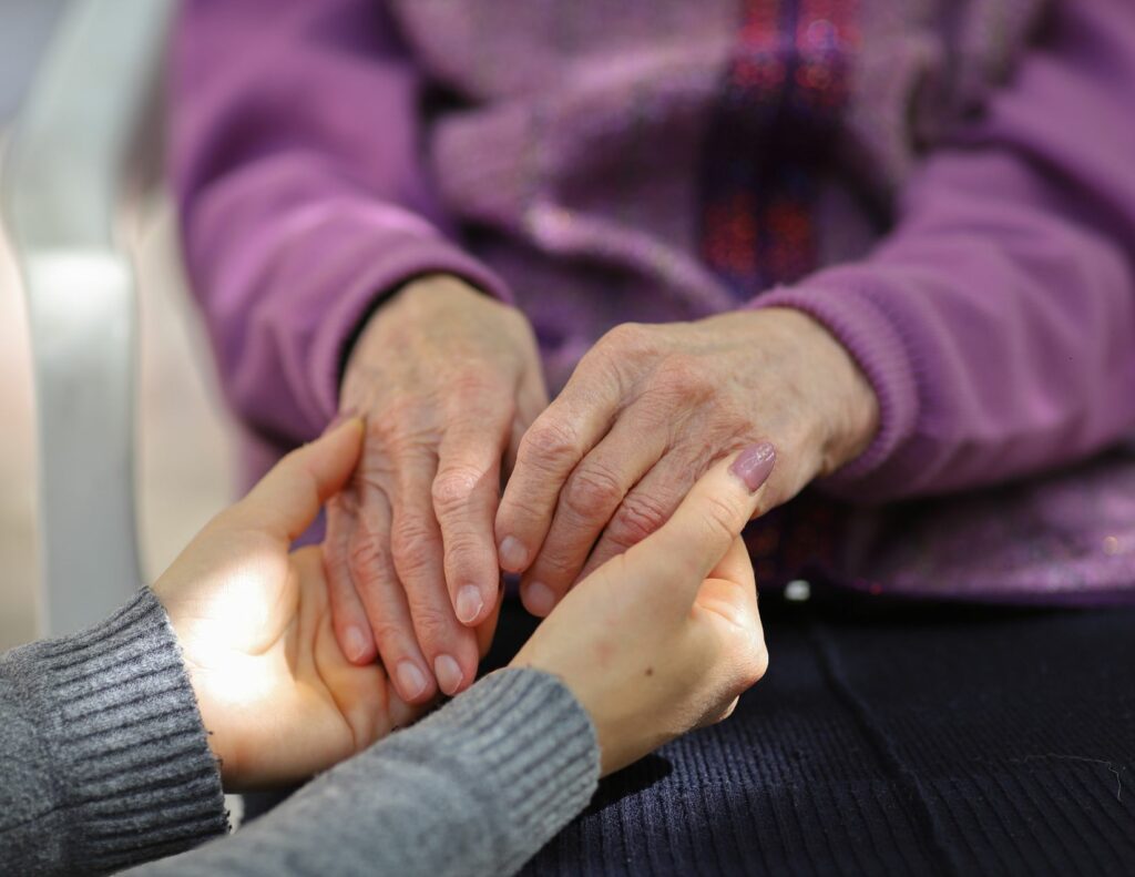 sandwich generation; 2 people holding hands