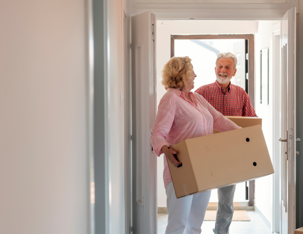 an aging adult couple moving into a new home
