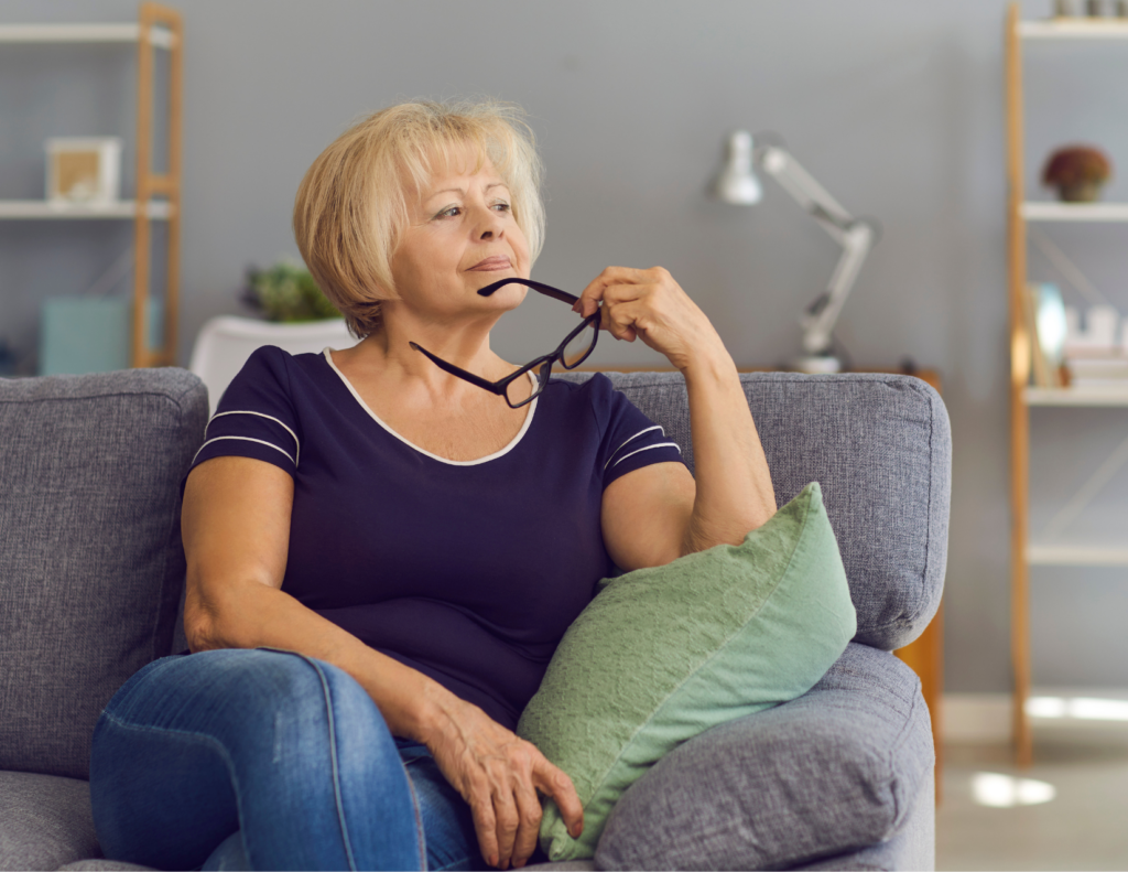 aging adult thinking about whether or not she needs to move houses